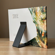 Minimalist Angled Desktop Vinyl Record Display Stand, Stable Album Holder for Tabletop Display — product scene