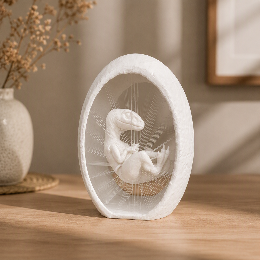 Suspended String Art Dinosaur Embryo in Egg Decorative Ornament — product scene