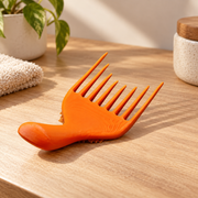 Ergonomic Hairbrush Cleaner Tool, Wide Spaced Teeth for Removing Hair and Debris from Hairbrushes — product scene
